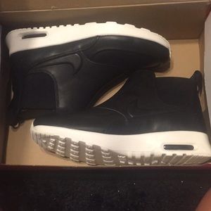 Nike black air max mids